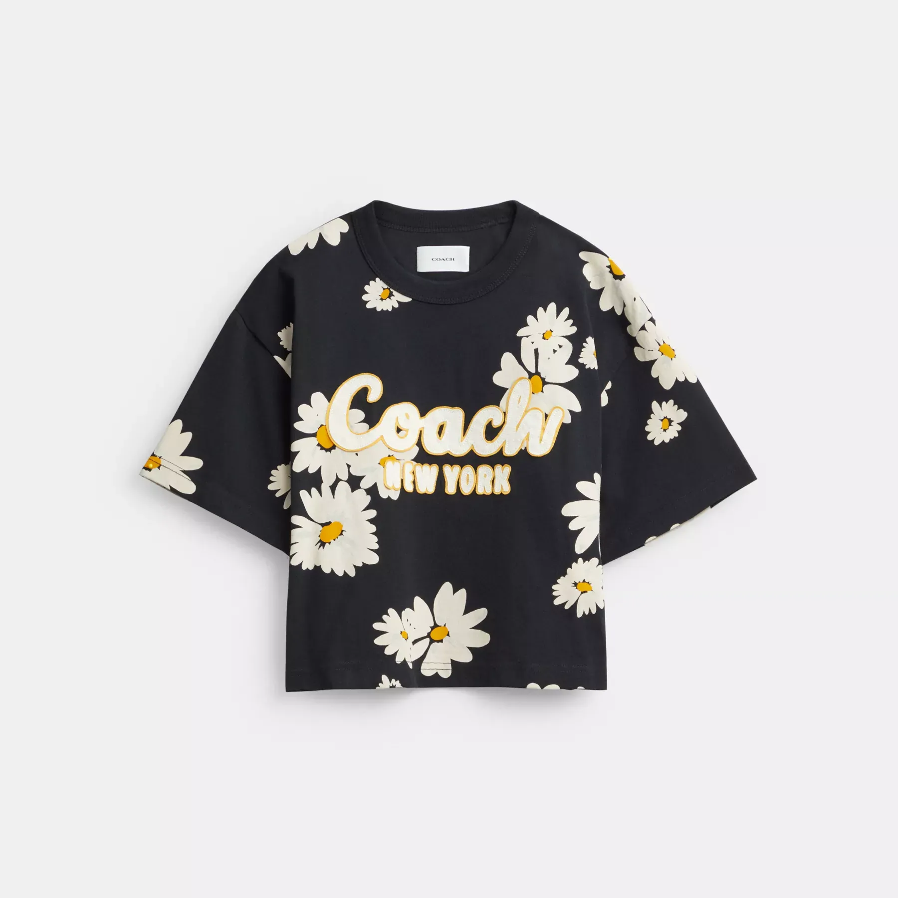 COACH Blommig beskuren Signature Script T-shirt i ekologisk bomull Svart Multi COACH Blommig beskuren Signature Script T-shirt i ekologisk bomull Svart Multi