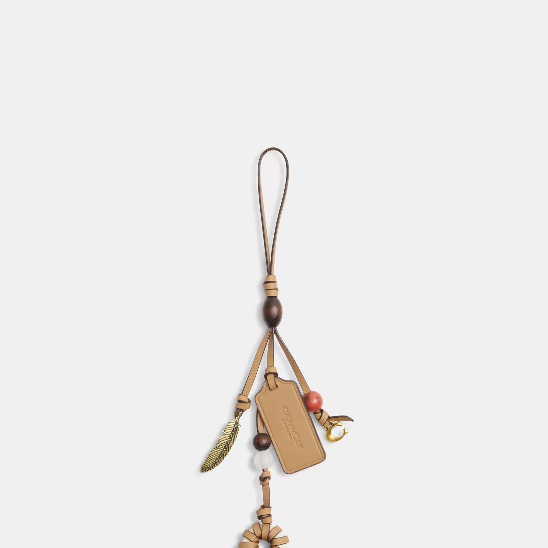 COACH Heritage Bag Charm Solbränna