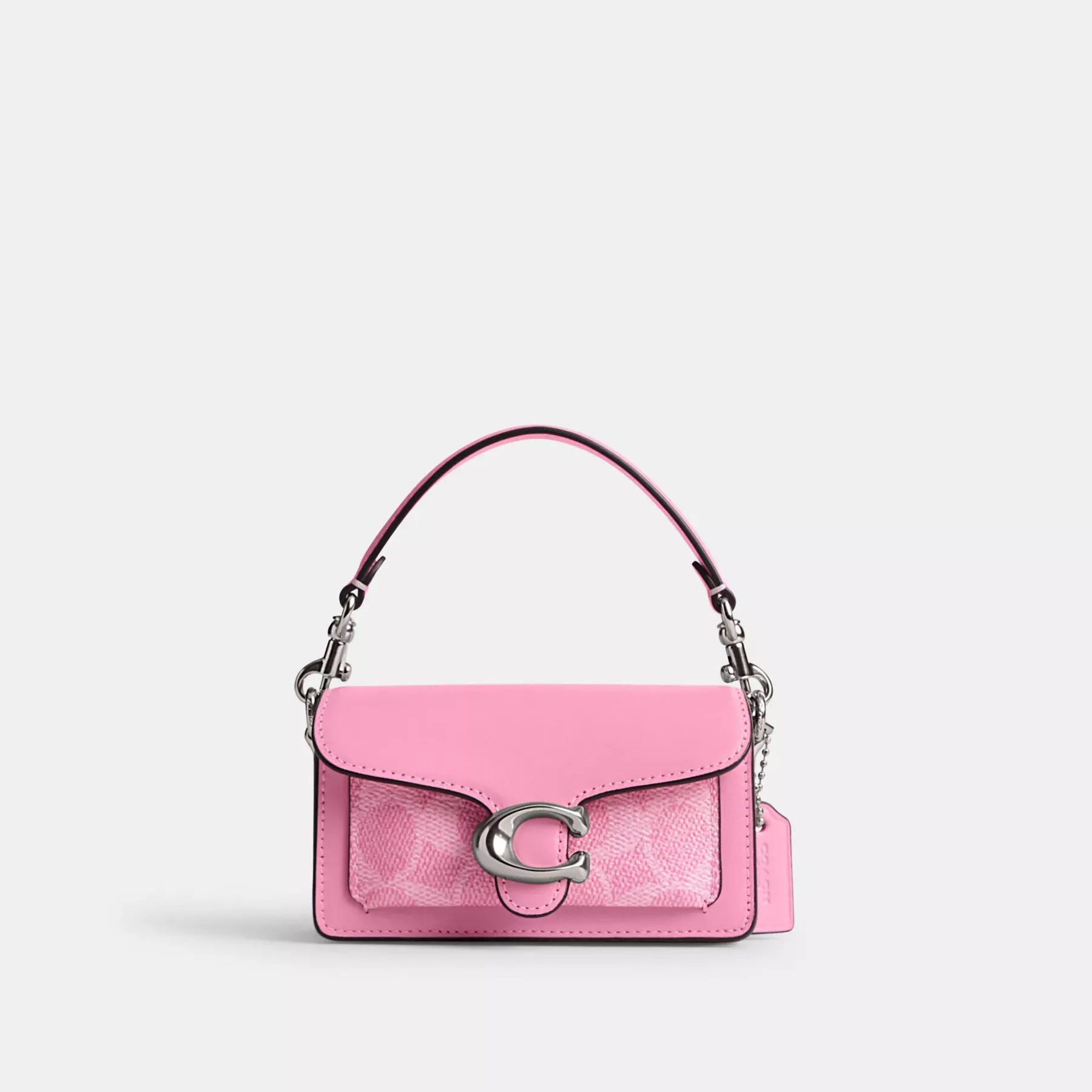 COACH Tabby 12 i signaturduk Levande rosa COACH Tabby 12 i signaturduk Levande rosa